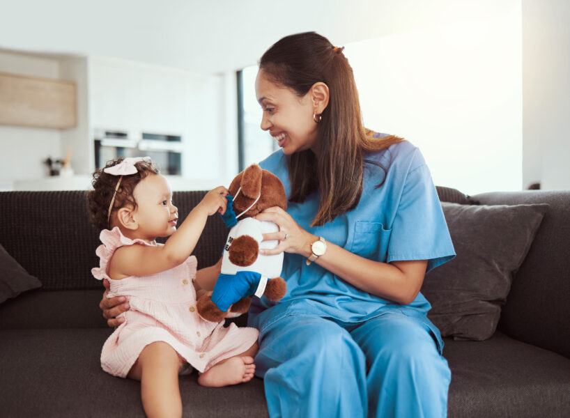 Pediatrician doctor consulting kid, teddy bear and happy healthcare checkup at home visit. Happy baby girl, occupational therapy and woman nurse therapist play in lounge for children wellness service.